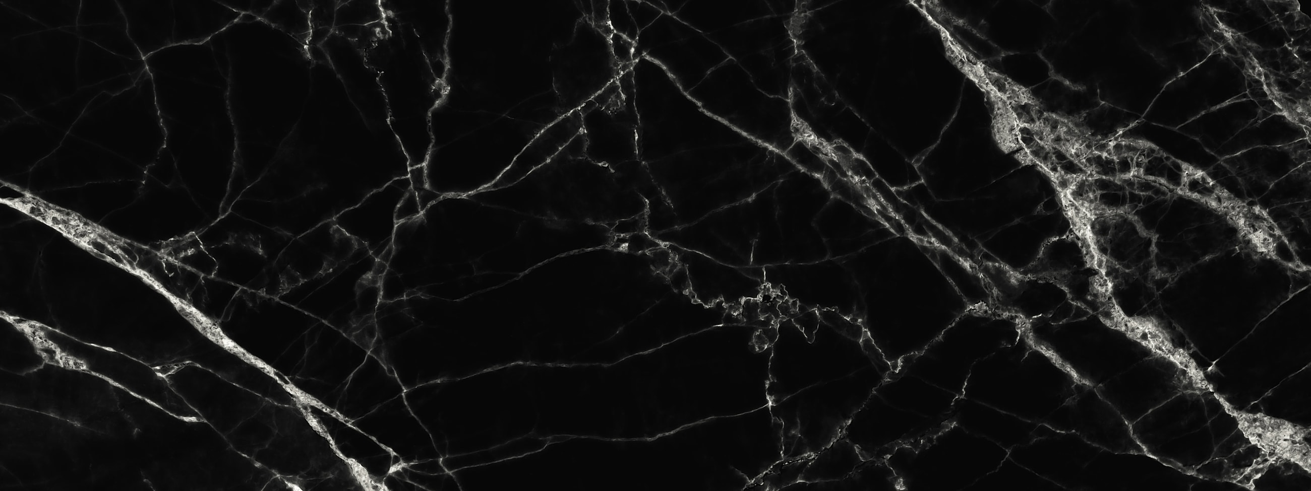 Black marble with white veining texture.