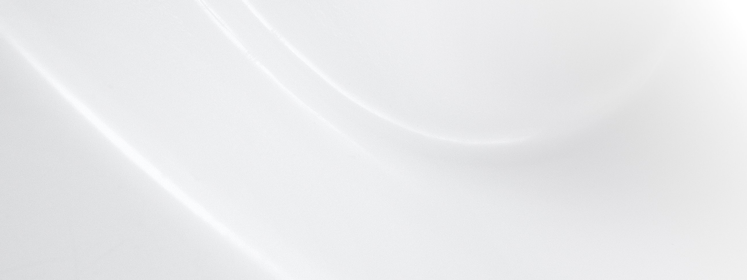 Abstract white surface with soft curves.