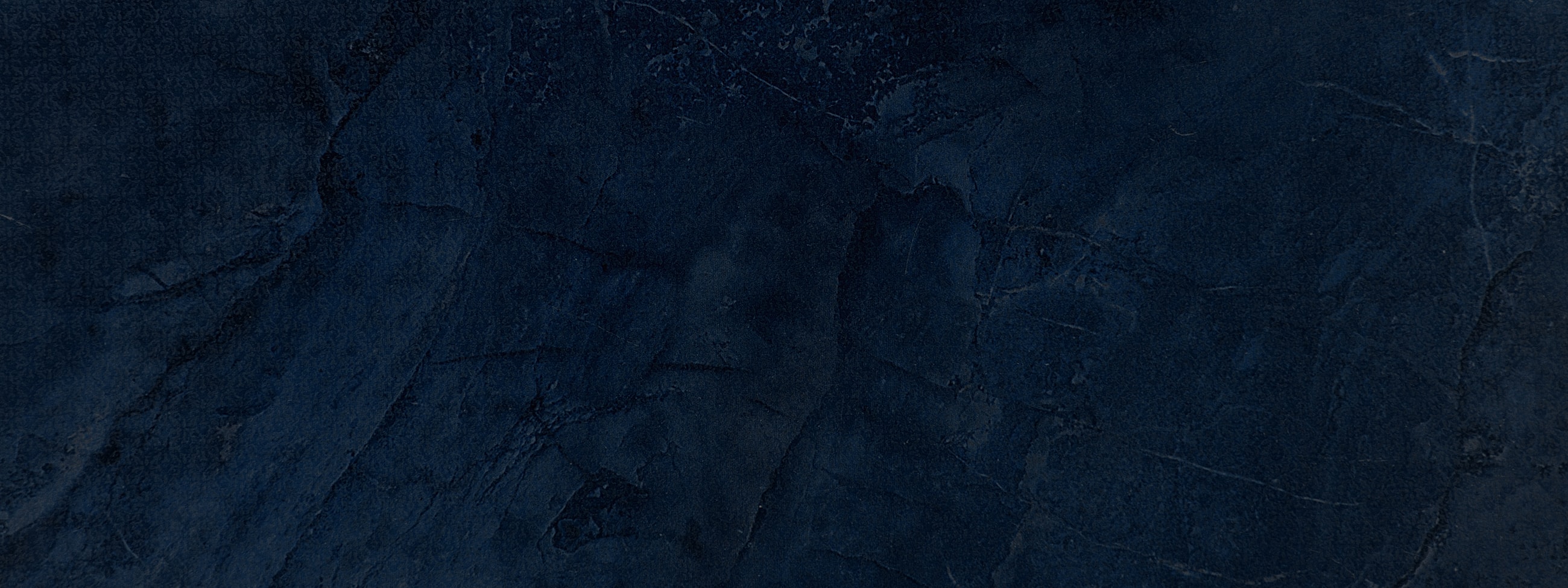 Dark blue textured background with subtle patterns.
